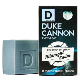 Duke Cannon bar in hand demonstrating size and long-lasting value