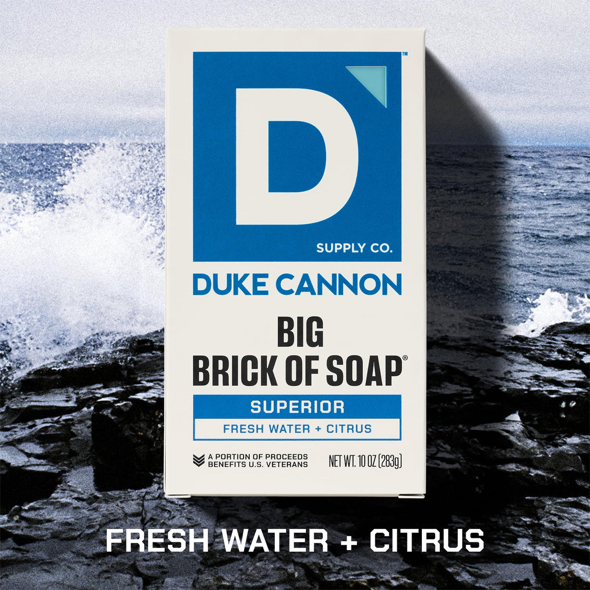 Duke Cannon Naval Diplomacy bar staged on sand evoking ocean-mandarin freshness after outdoor work