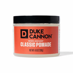 Duke Cannon jar front view showing label and strong hold benefit