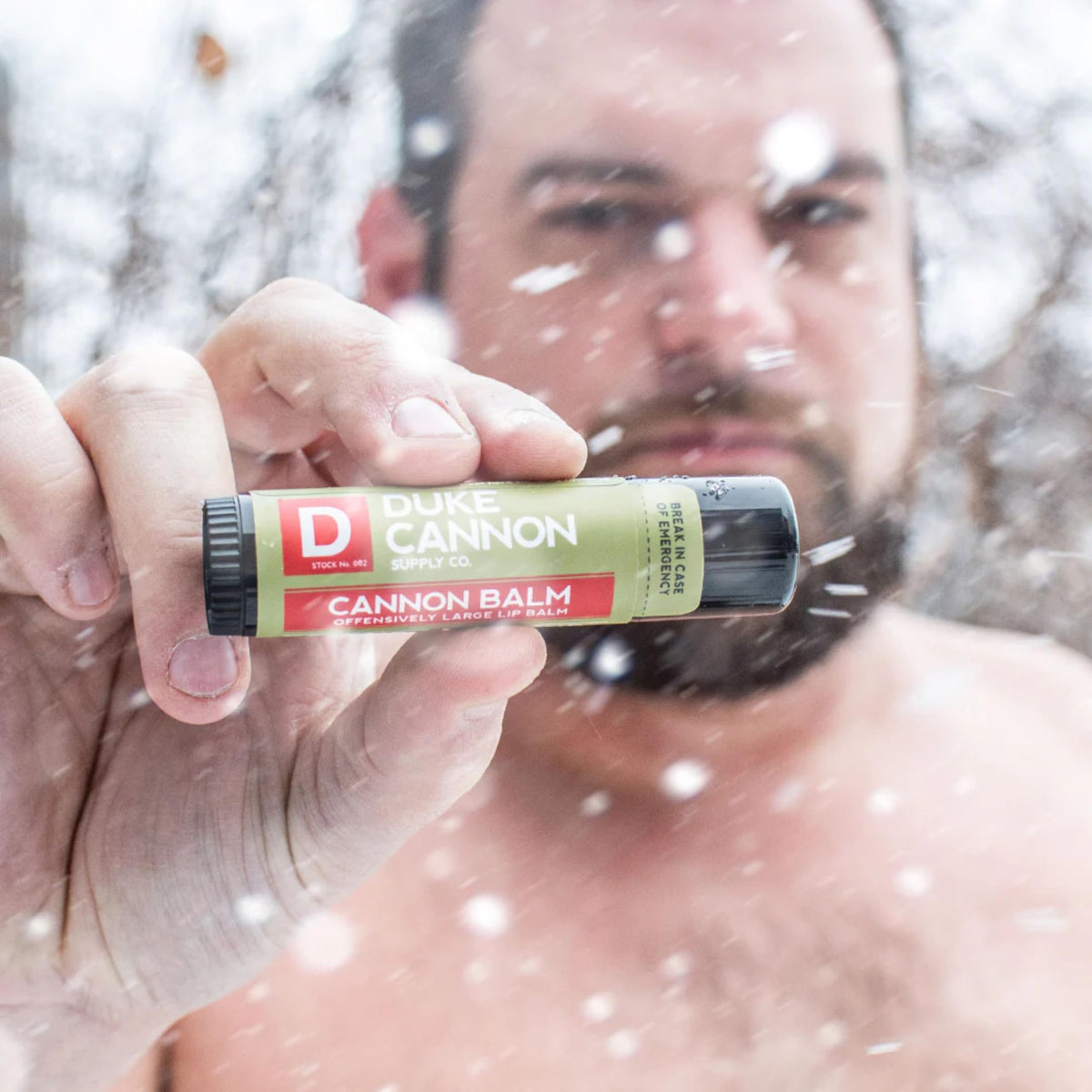 Duke Cannon being applied while hiking, offering sun protection and hydration