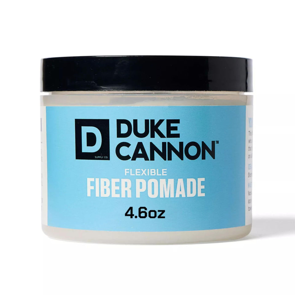 Duke Cannon pomade tin front view showing strong hold label and size benefit