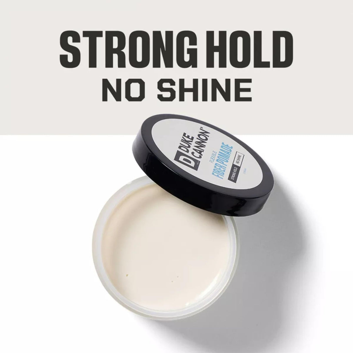 Duke Cannon pomade open close-up showing fibrous matte texture for volume