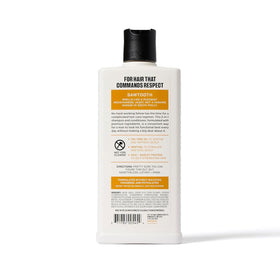 Duke Cannon on bathroom shelf styled with toiletries for rugged grooming aesthetic benefit