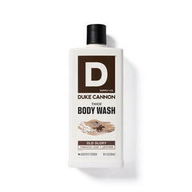 Duke Cannon bottle beside ruler showing actual product size for scale
