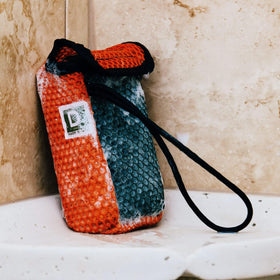 Duke Cannon soap bar close-up highlighting texture and long-lasting use benefit