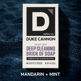 Duke Cannon close-up of gritty texture demonstrating exfoliating volcanic sand