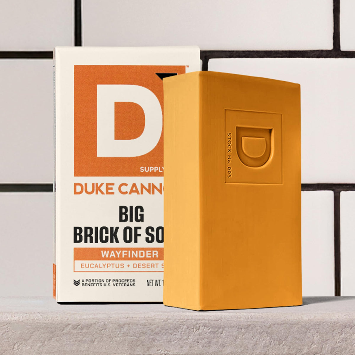 Duke Cannon Wayfinder on shower shelf lifestyle suggesting everyday grooming use