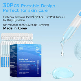 Dumie tube held in hand for size comparison and easy single-use portability