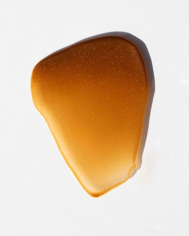 DUNE Golden Guard lotion texture swirl demonstrating fast absorption benefit