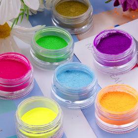 Duufin luminous powder glow demo showing night-time illumination after light exposure