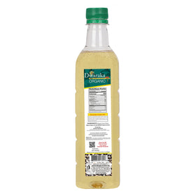 Dwaraka oil pouring closeup shows cold‑pressed texture for nutrient retention