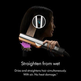 Dyson Airstrait on bathroom vanity lifestyle shot, simplifying daily routines