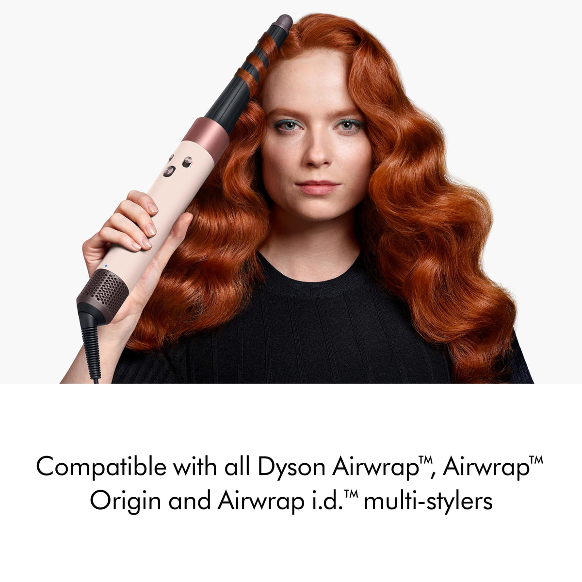 Dyson conical Airwrap being used to curl hair for defined root lift benefit