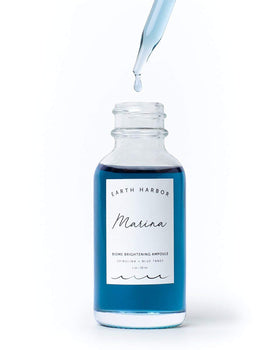 Earth Harbor MARINA dropper dispensing serum, demonstrating easy precise application