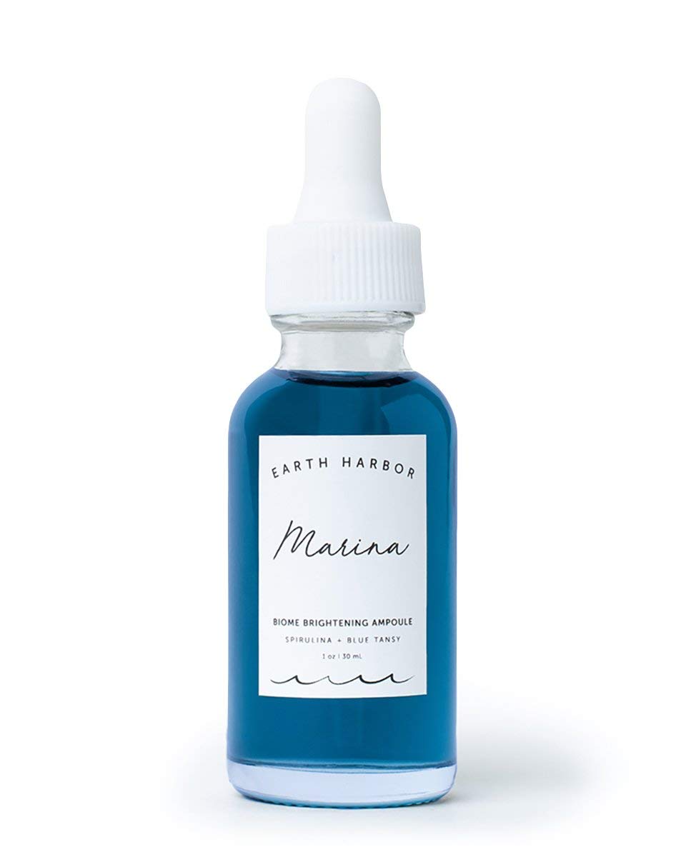 Earth Harbor MARINA front packaging showing bottle and branding for brightening