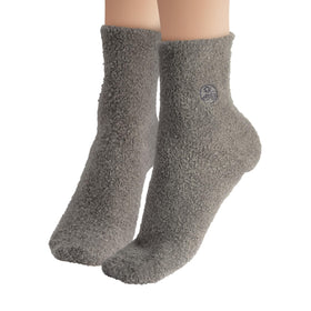 Earth Therapeutics aloe socks label and fabric tag showing materials and origin