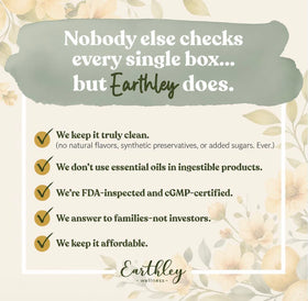 Earthley Wellness next to a coin showing 4 oz scale and travel-friendly size
