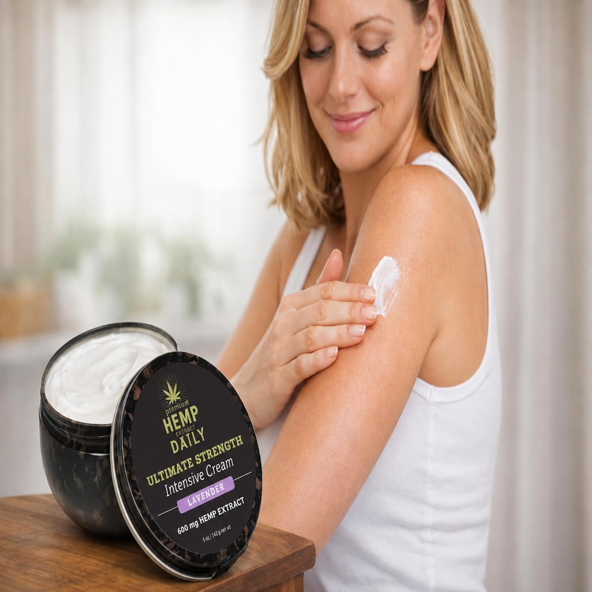 Earthly Body cream being applied to hand demonstrating fast absorption and non-greasy feel