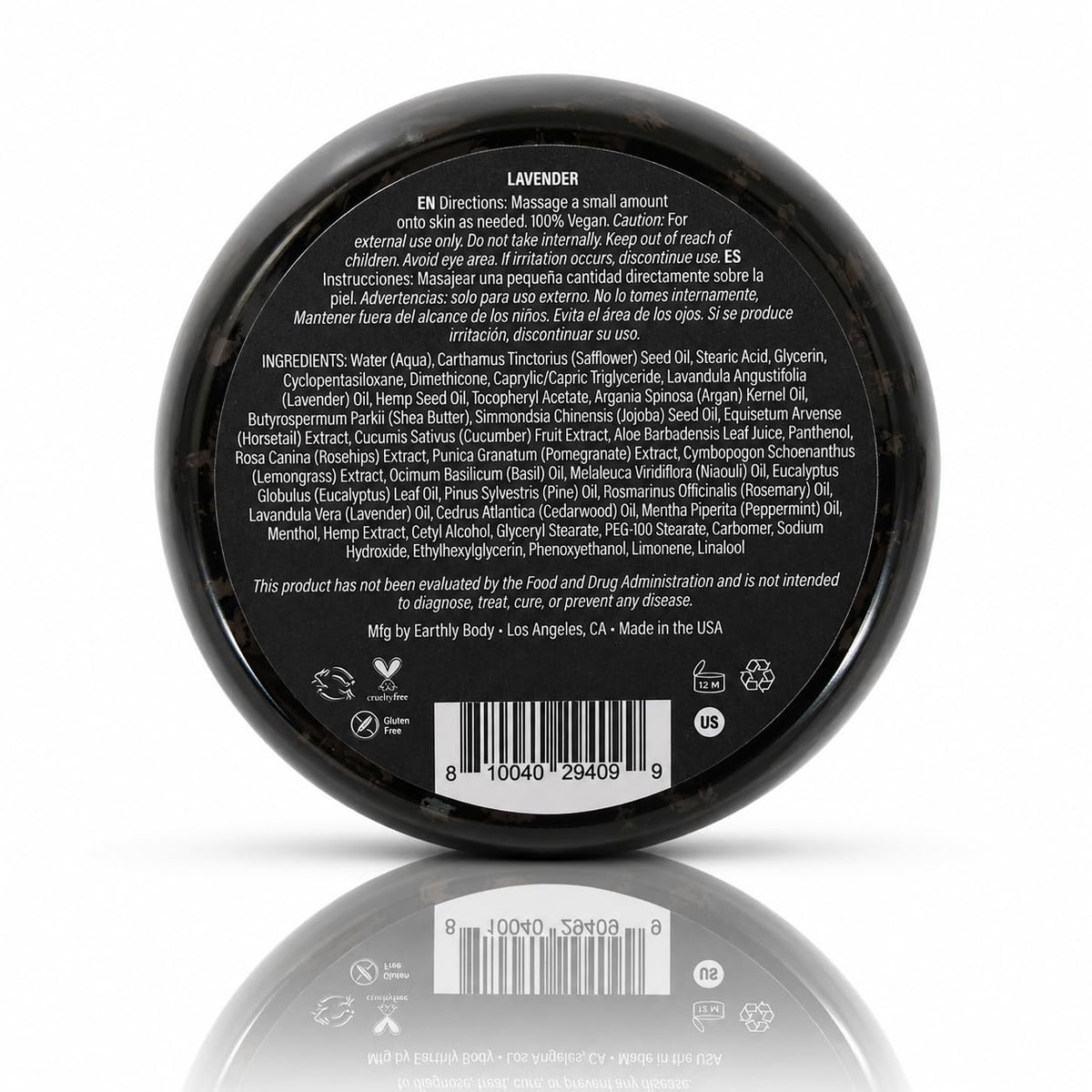 Earthly Body 5oz jar next to everyday objects illustrating portable size benefit