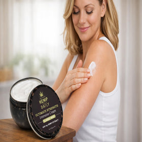 Earthly Body applying menthol cream to hand for cooling, quick absorption benefit