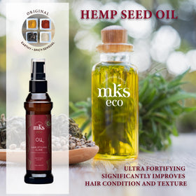 Earthly Body MKS eco Oil smoothed onto hair ends showcasing reduced frizz and added shine