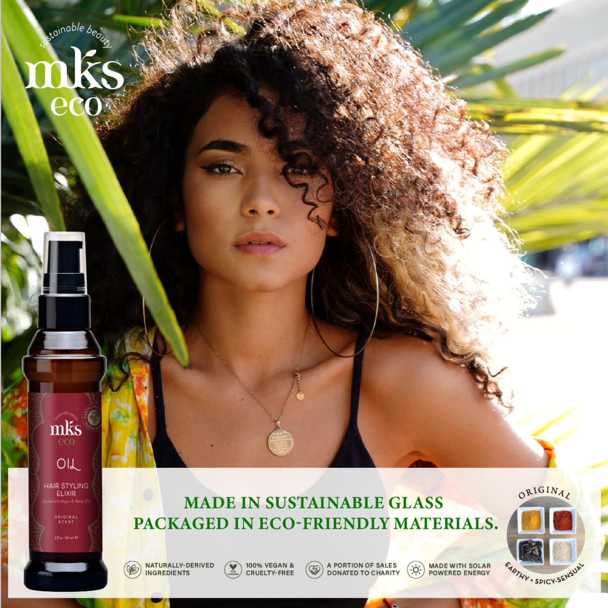 Earthly Body MKS eco Oil beside a ruler to indicate compact 2 fl oz travel-friendly size