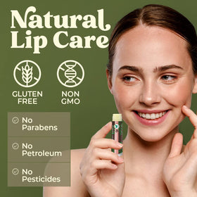 Earth's Daughter lip balm next to a hand for size and portability comparison ideal for pockets