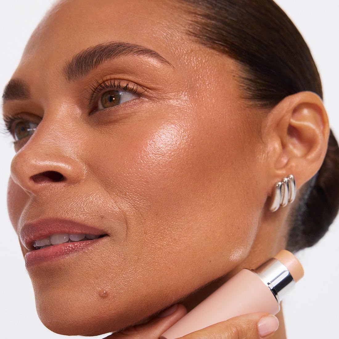EarthsCure Glow Glaze in lifestyle brunch setting for effortless day-to-night radiance