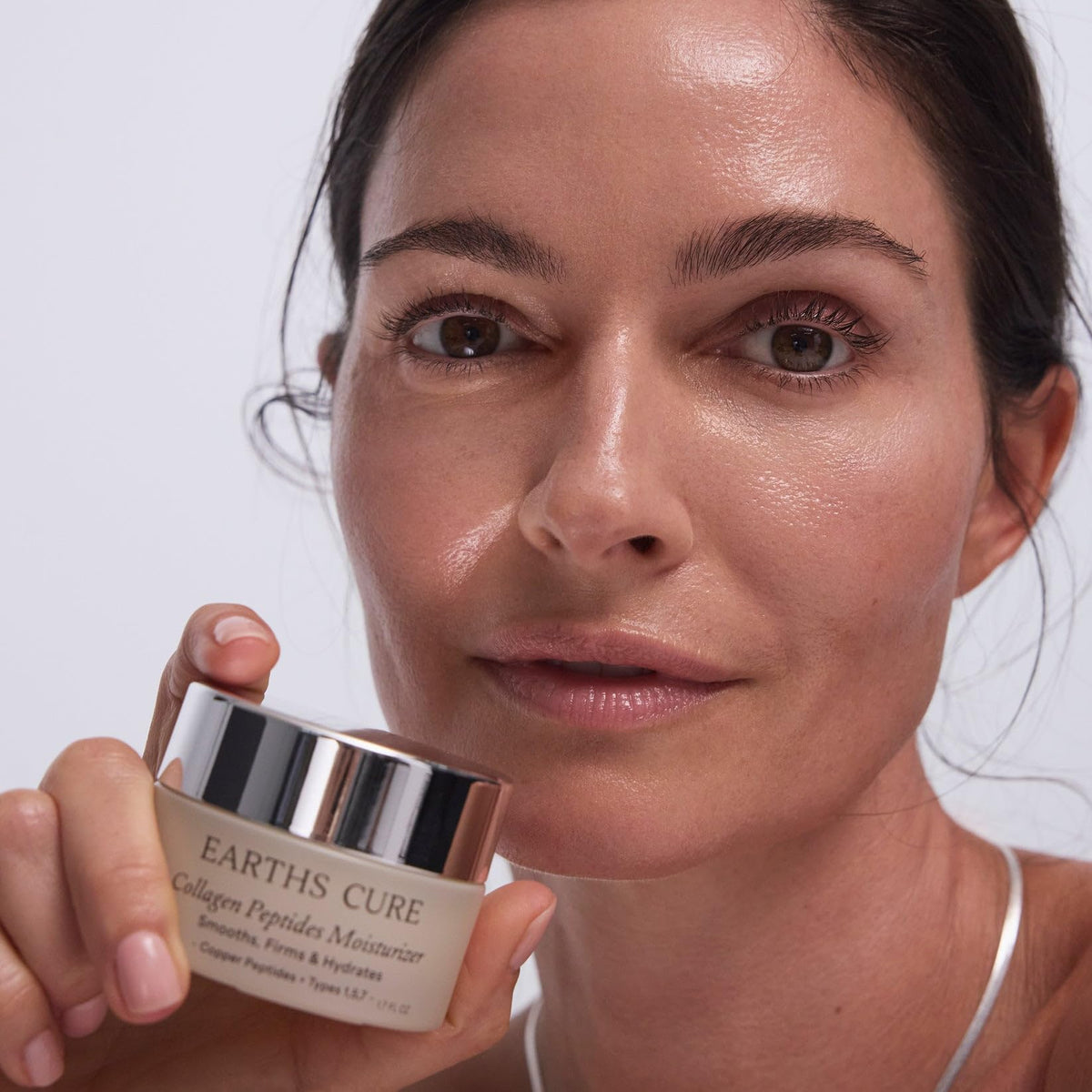 EarthsCure open cream close-up texture highlighting smooth, lightweight finish benefit