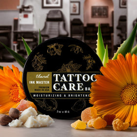 Tattoo artist holding Ebanel jar ready to apply for client comfort