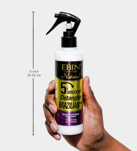 EBIN NEW YORK applying detangler to wig for smoother styling