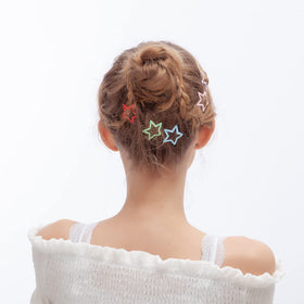 ECADY clip securing child's hair demonstrating secure hold and tidy look