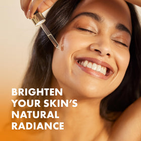 Eclat Skincare applied to cheek illustrating smooth absorption and glow