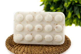 ECO Amenities individually wrapped soap unwrapped to display hygienic single-use benefit