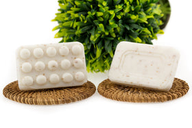 ECO Amenities soap held in hand to show compact 1.5-ounce travel-size advantage