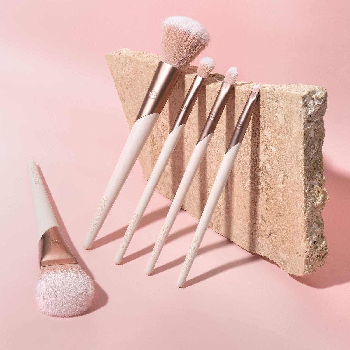 EcoTools limited-edition packaging open to show brushes and sustainable presentation benefit