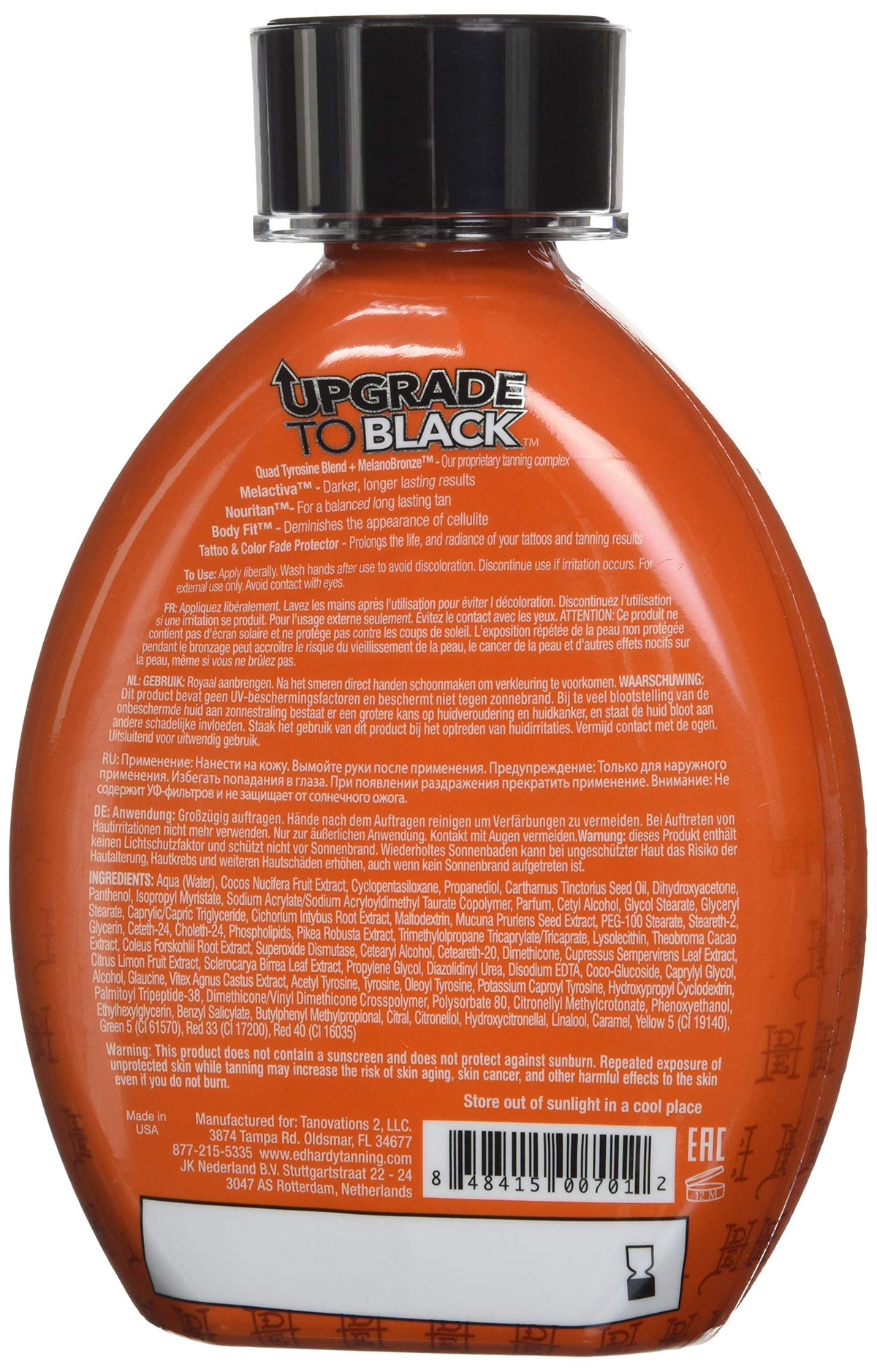 Ed Hardy bronzer lotion texture close-up demonstrating rich coverage