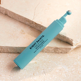 Eight Saints close-up roller-ball applicator demonstrating cooling benefit