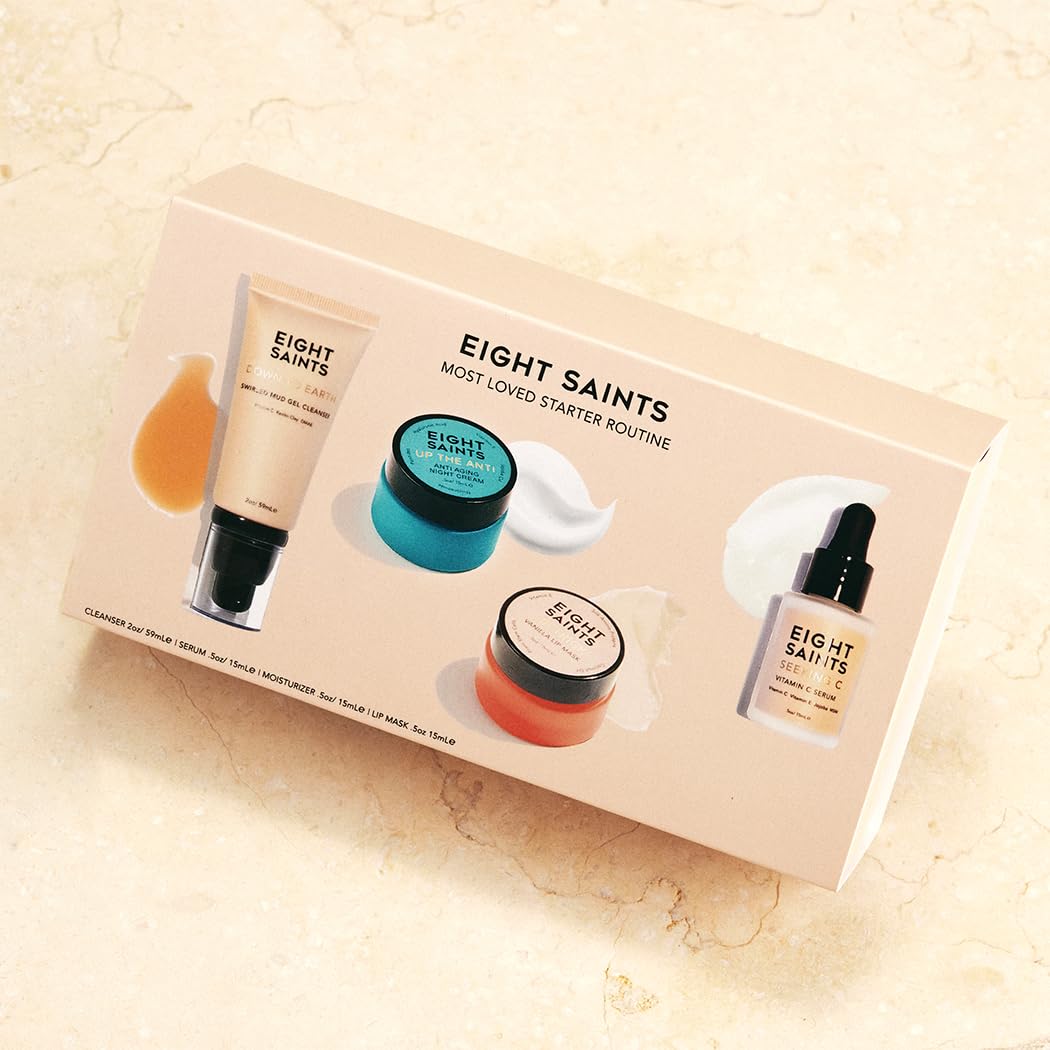 Eight Saints Seeking C serum dropper dispensing a vitamin C drop for brightening