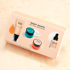 Eight Saints Seeking C serum dropper dispensing a vitamin C drop for brightening