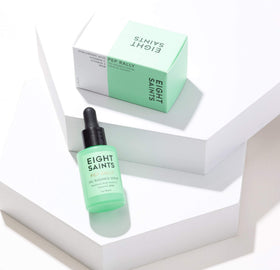 Eight Saints dropper dispensing clear serum, precise application benefit