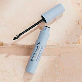Eight Saints clear serum texture on skin, demonstrates lightweight hydrating finish