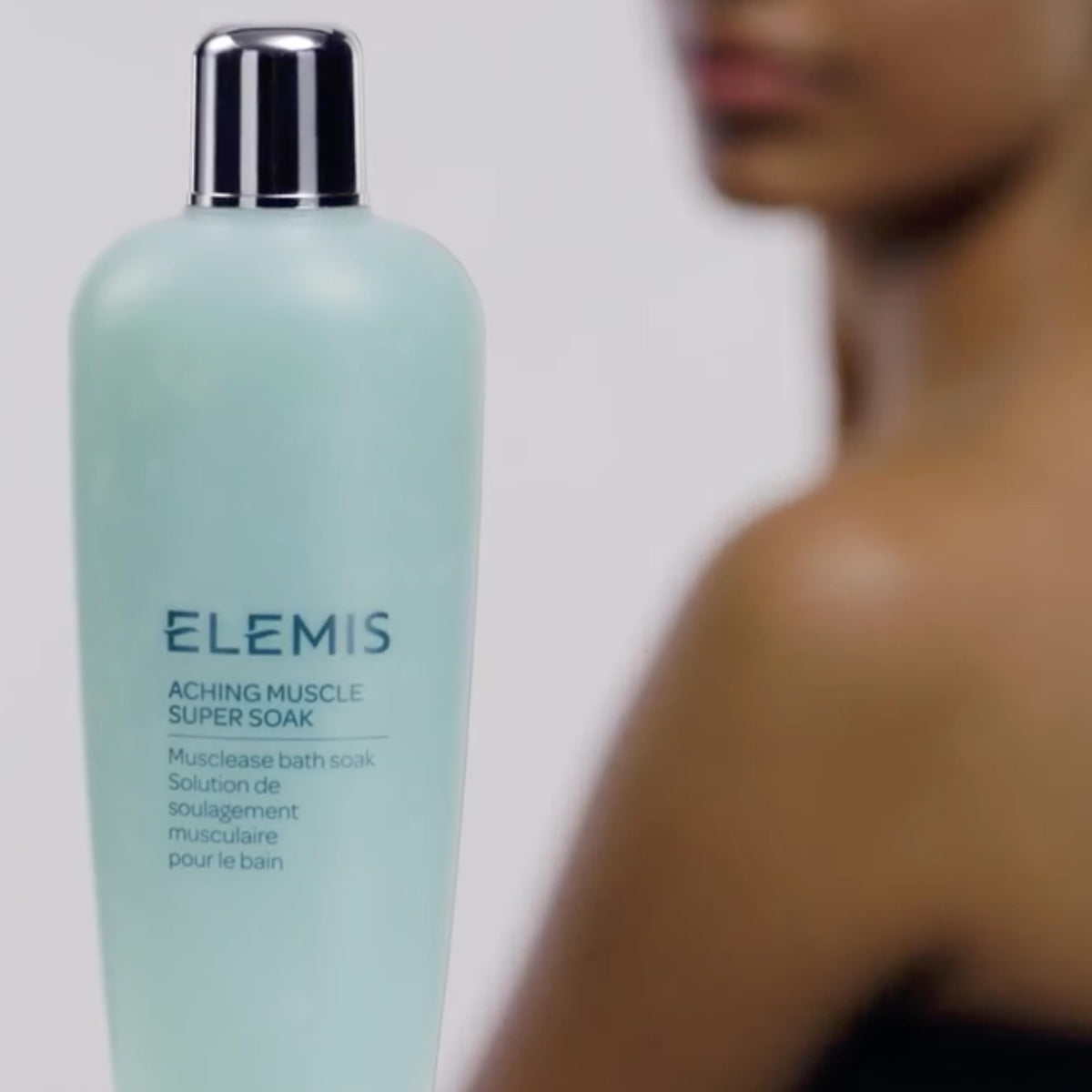 ELEMIS person enjoying bath illustrating muscle relief and relaxation