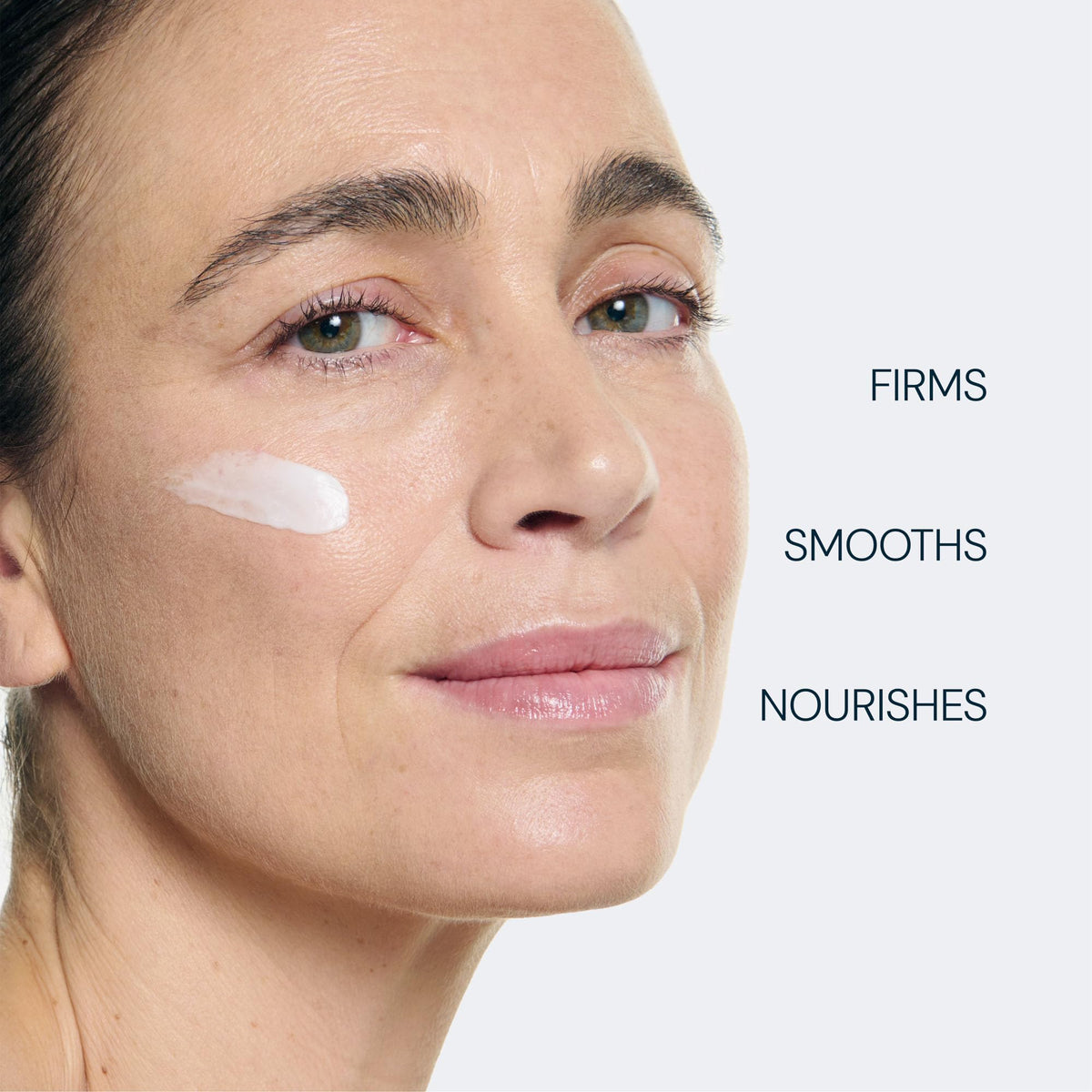 ELEMIS cream on fingertips ready to apply, demonstrating easy spread and nourishment