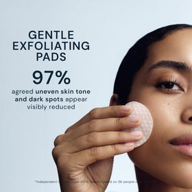 ELEMIS pad held in hand during application showing convenient single-step use benefit