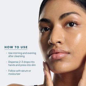 ELEMIS 100ml size comparison with hand to show true scale and travel-friendly volume benefit