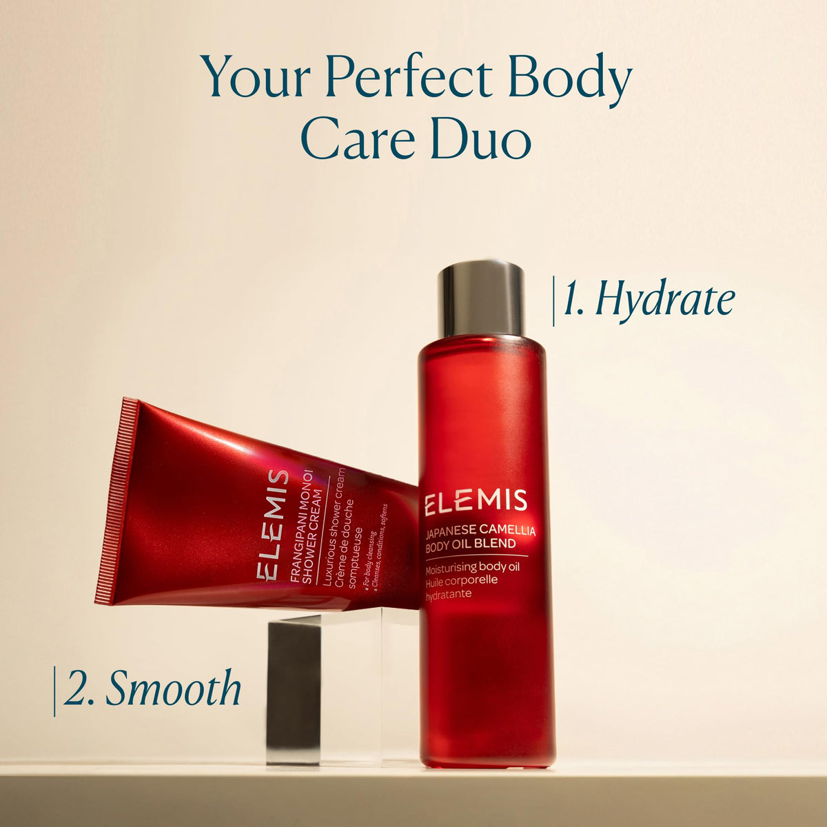 ELEMIS 100 mL bottle next to a hand for accurate size comparison
