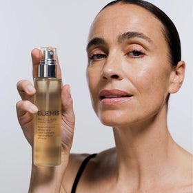 ELEMIS bottle staged in bathroom routine to show calming scent and ritual use