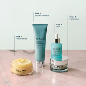 ELEMIS cleansing mousse staged in bathroom for a calming routine benefit.