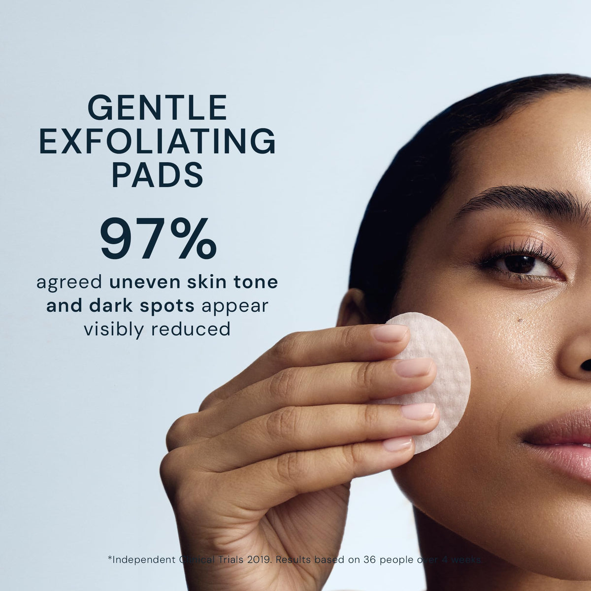 ELEMIS pad in hand illustrating size and easy one-step exfoliation